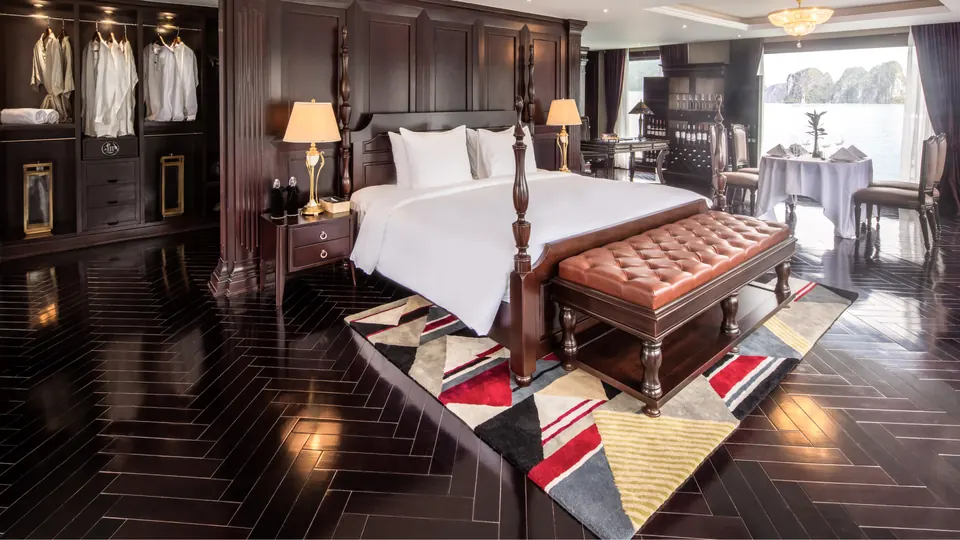 Presidential Suite bedroom with a four poster bed and a walk-in wardrobe