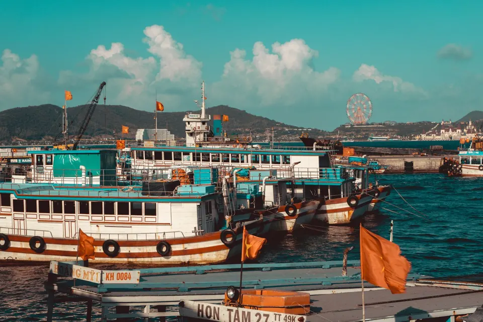 Ferries at the pier waiting to cross to Cat Ba