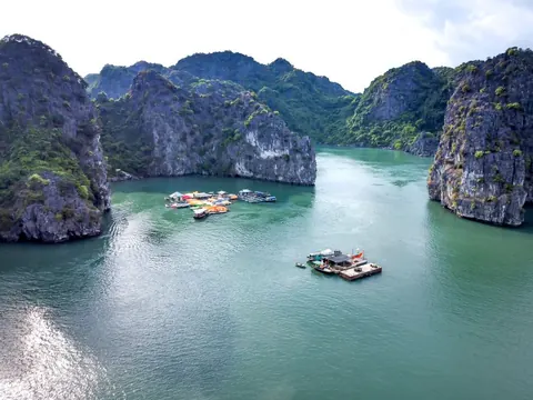 A quiet channel between tall karst islands in Lan Ha Bay